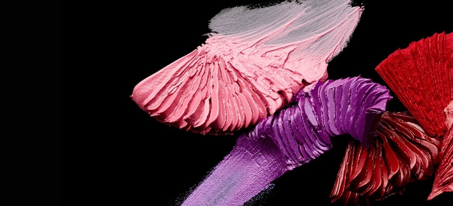 Zoomed in swatches of the color pink, purple and red